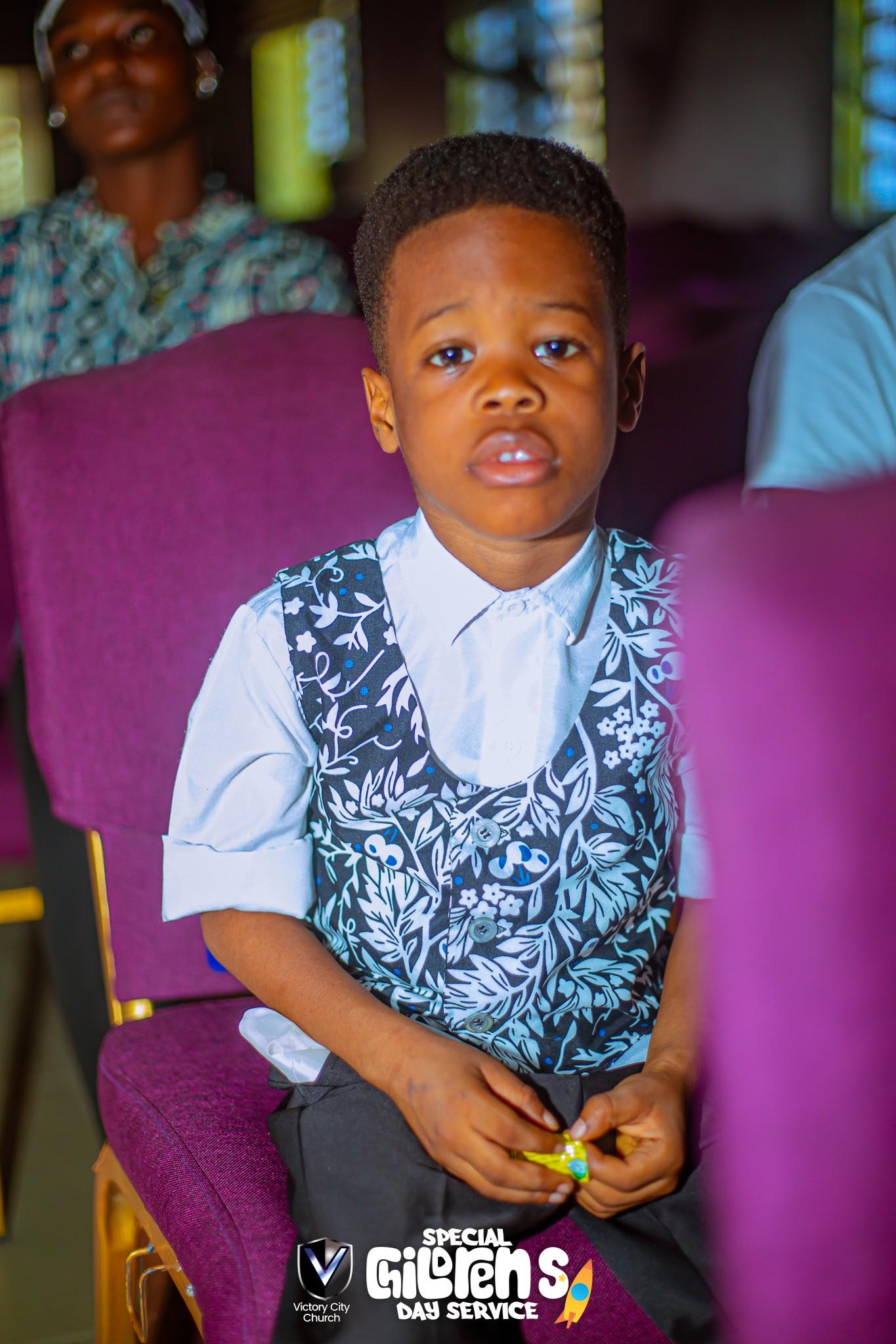 A child at a Victory City service