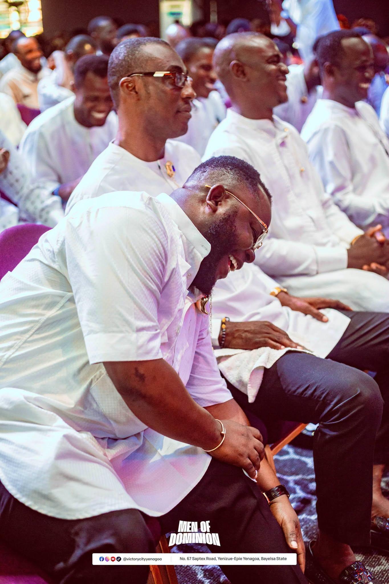 Men sharing a joyful moment during fellowship